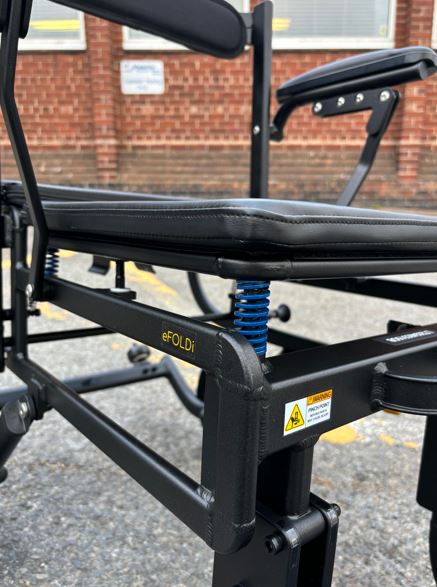 Under seat suspension of eFOLDi Lite mobility scooter