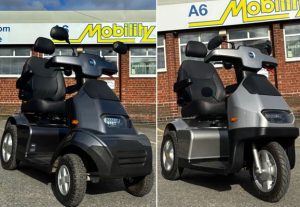 2 silver and grey mobility scooters outside A6 Mobility Shop in Stockport, Greater Manchester