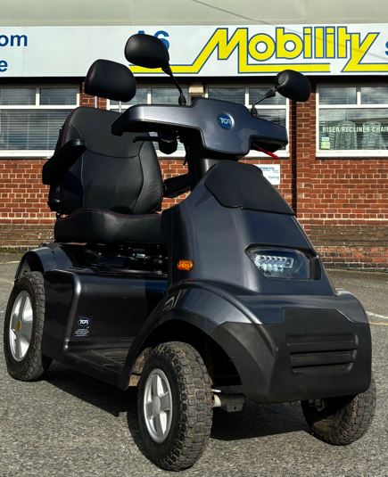 Large TGA 4 wheel mobility scooter outside A6 Mobility Shop
