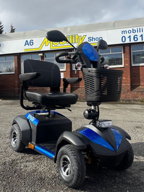 Blue and black Drive Envoy scooter outside A6 Mobility Shop in Stockport, Greater Manchester