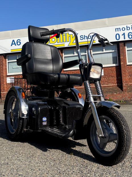 Motorbike style mobility scooter outside A6 Mobility Shop in Stockport, Greater Manchester